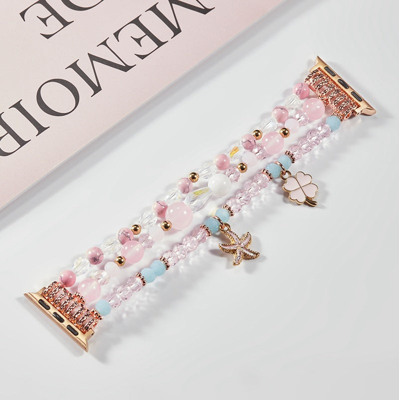 Blue pearl beaded Apple Watch band on wrist