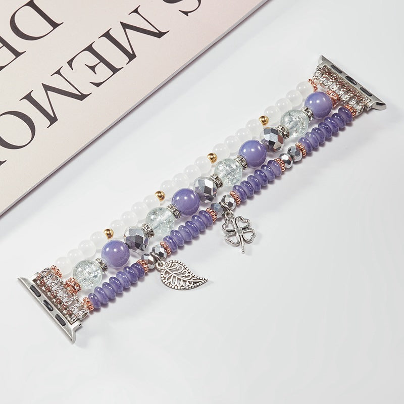 Flat lay of the pearl beaded Apple Watch strap