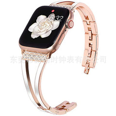 Apple Watch bands displayed on a soft surface