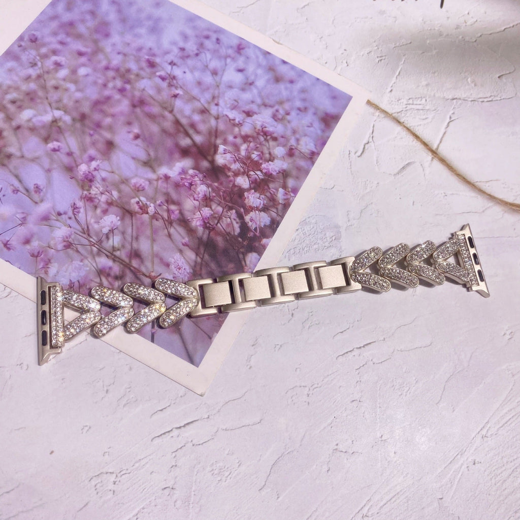 Starlight coloured metal band for Apple Watch