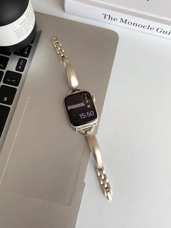 Detailed view of X-shaped links in Apple Watch Band