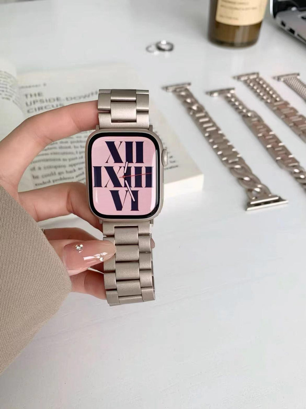 Various sizes of Starlight Metal Apple Watch Band