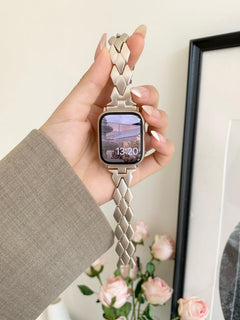 Detailed view of X-shaped links in Apple Watch Band