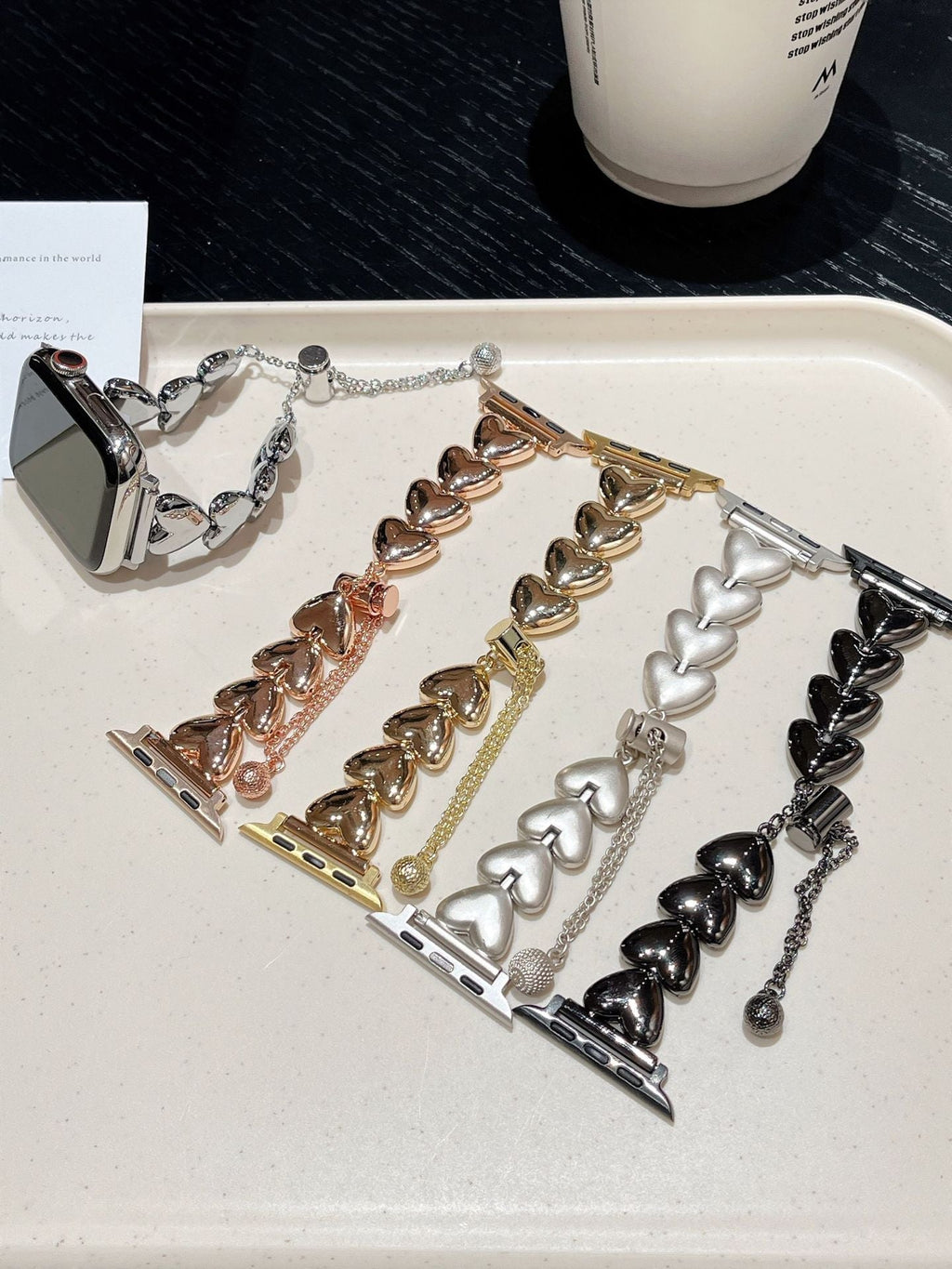 Metal heart link bracelet showcasing different colours