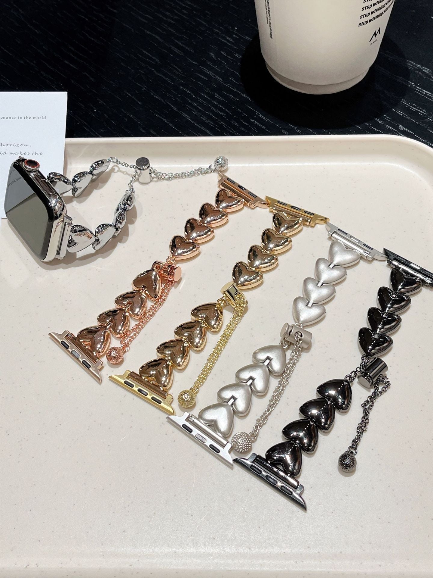 Metal heart link bracelet showcasing different colours