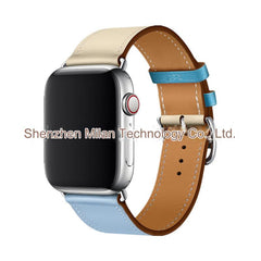 Model wearing Apple Watch with leather band