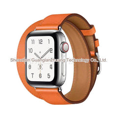 Model wearing Apple Watch with leather band