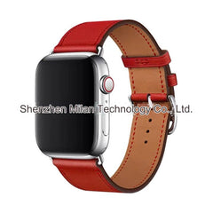 Model wearing Apple Watch with leather band