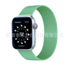 Milanese loop band shown on model's wrist