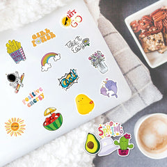 luggage decorated with aesthetic stickers