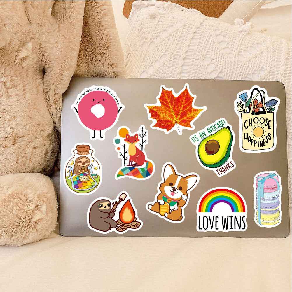 luggage decorated with aesthetic stickers