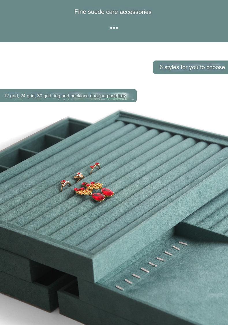 Close-up of the elegant ivory jewellery tray