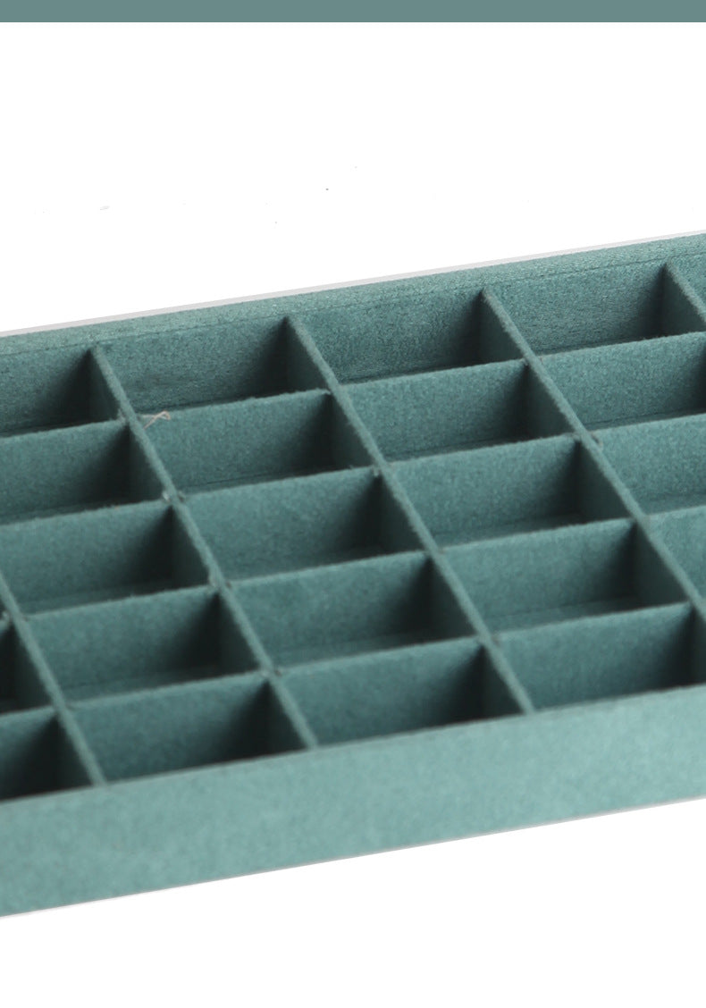 Close-up of the elegant ivory jewellery tray