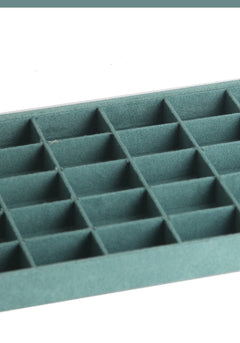 Close-up of the elegant ivory jewellery tray