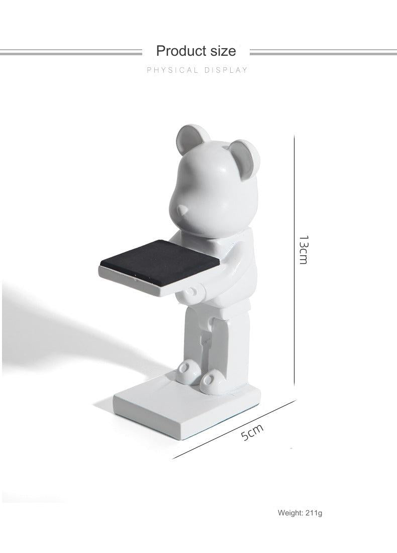 Astronaut resin stand with Apple Watch displayed