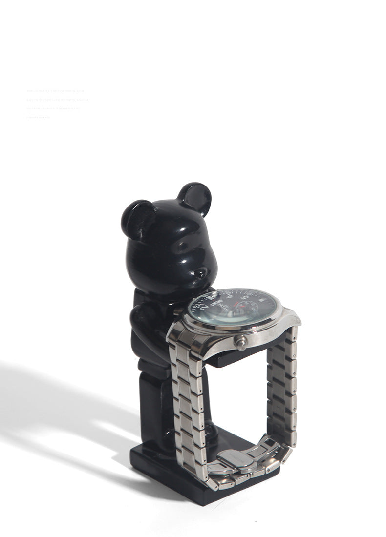 Desk with astronaut resin stand and office items