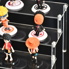 Empty multi-tiered acrylic display stand in retail store