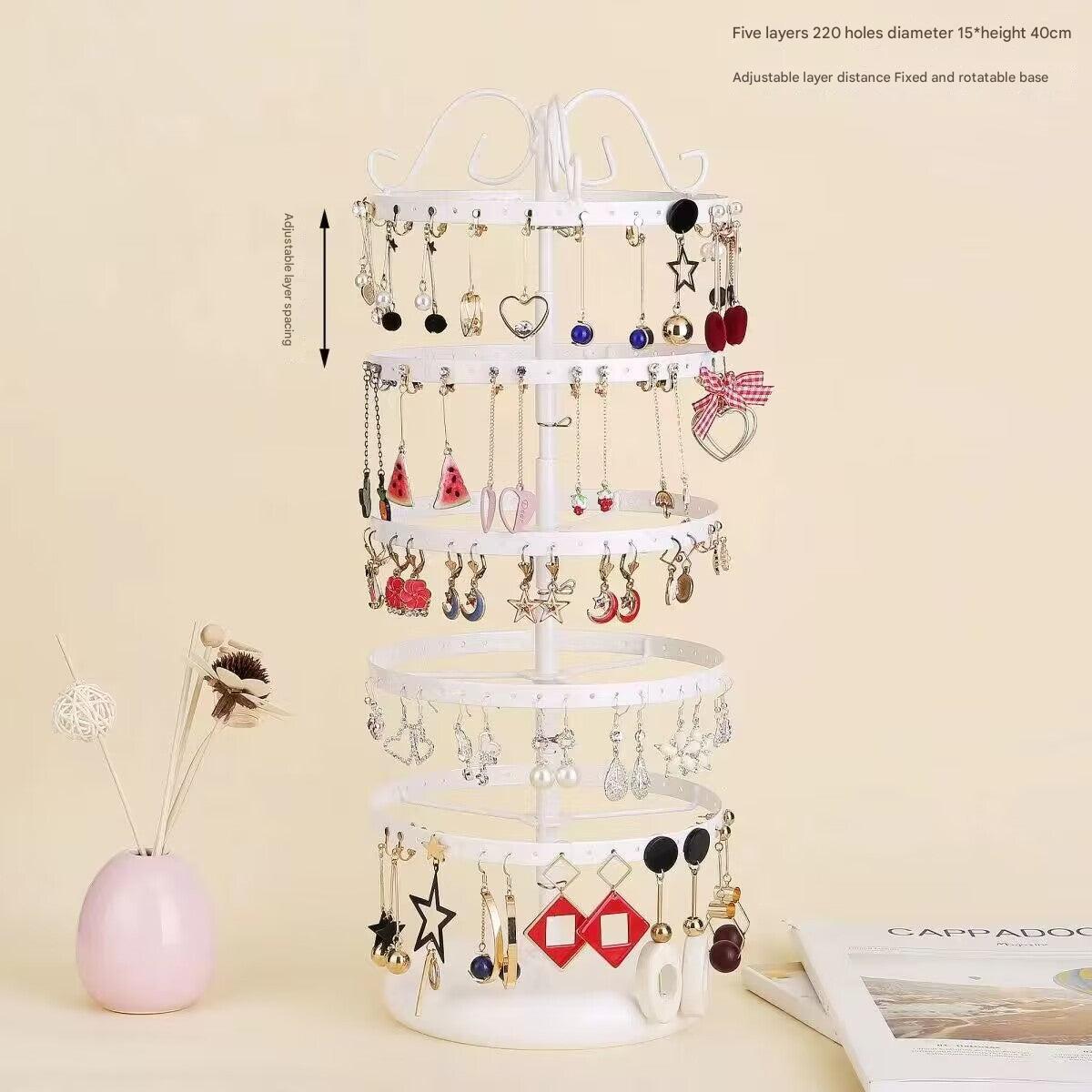 Sleek black and white rotating earring holder