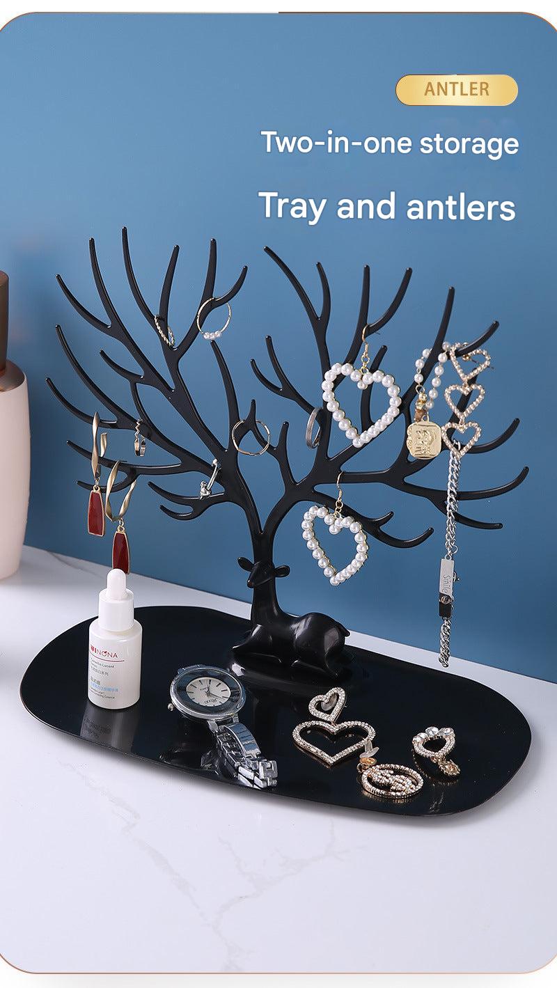 Stylish black and white jewelry tree on home vanity