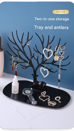 Stylish black and white jewelry tree on home vanity