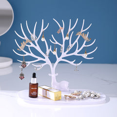 Chic white jewelry organizer holding earrings