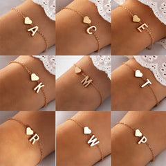 Gold heart-shaped bracelet on display