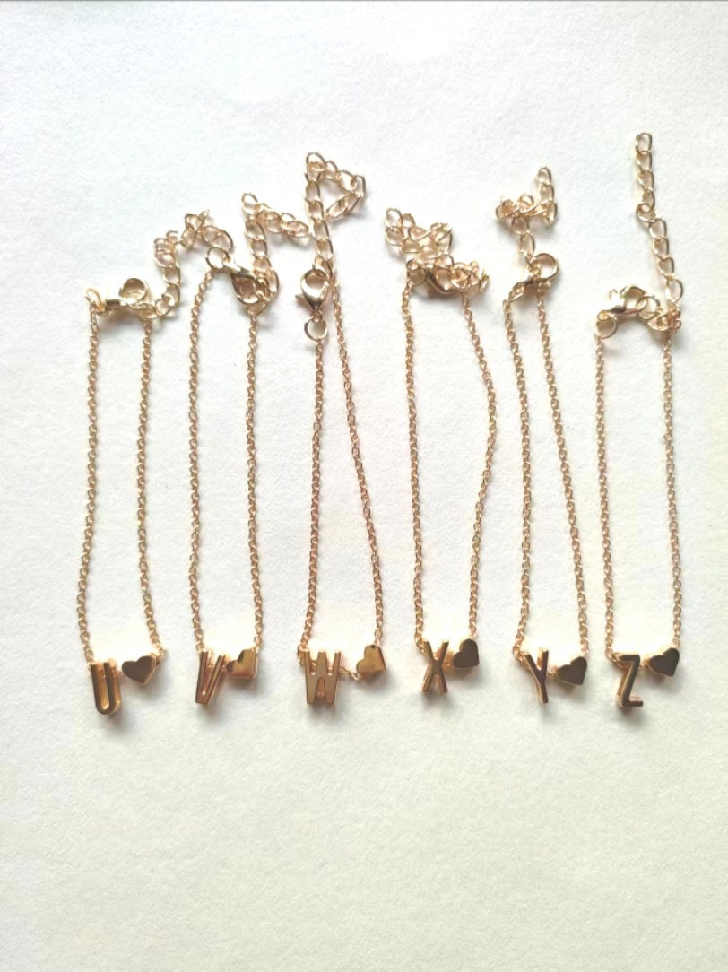 Gold heart-shaped bracelet on display