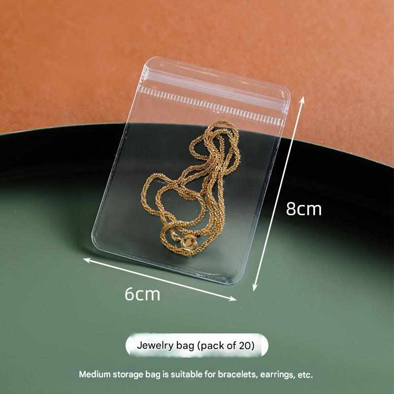 Stylish jewellery organiser featuring clear pouches for rings