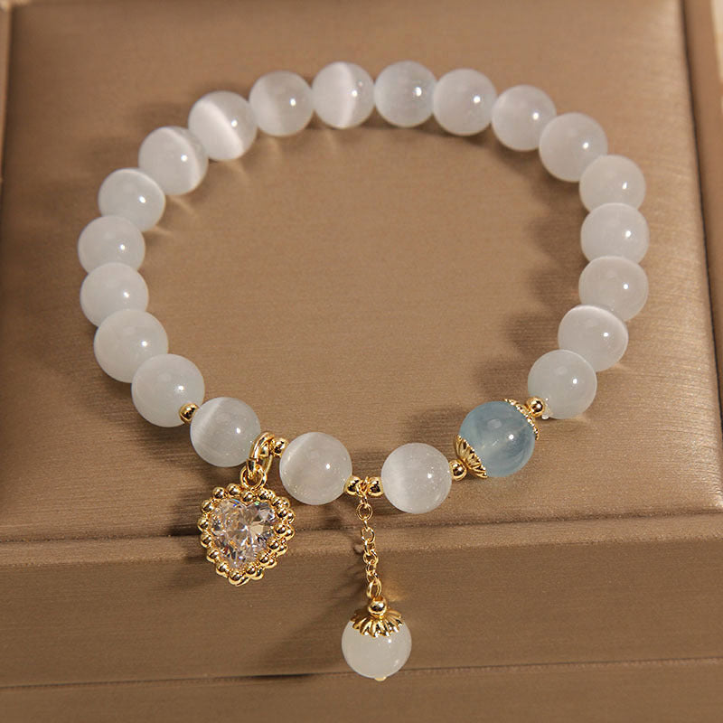 Adjustable cat eye stone bracelet on wrist