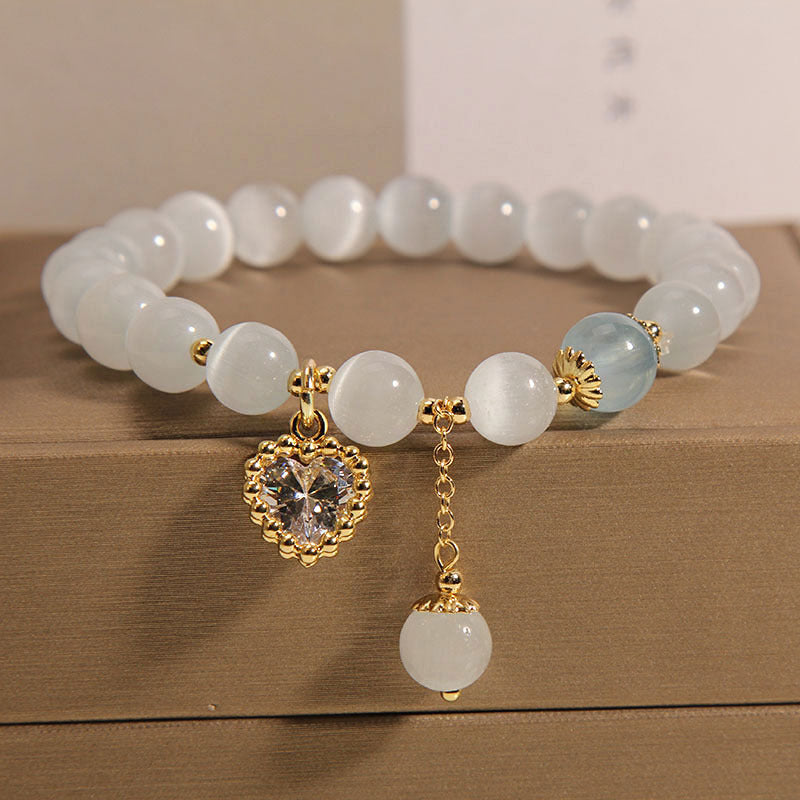 Detail image showing the heart pendant on bracelet