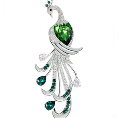 Close-up detail of green zircon stones on brooch
