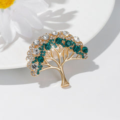 Flat lay of lucky tree brooch
