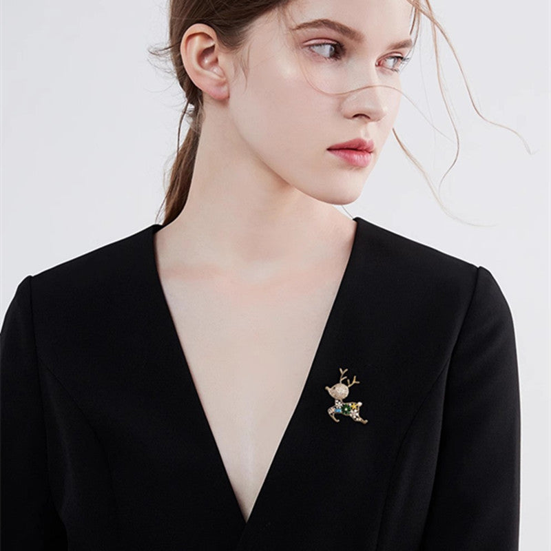 Versatile Animal Brooch displayed on fabric