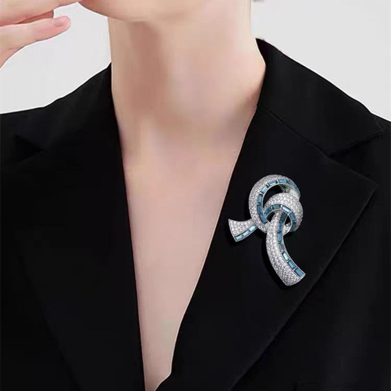 Close-up of Crystal Accented Bow Tie Brooch - Image 2