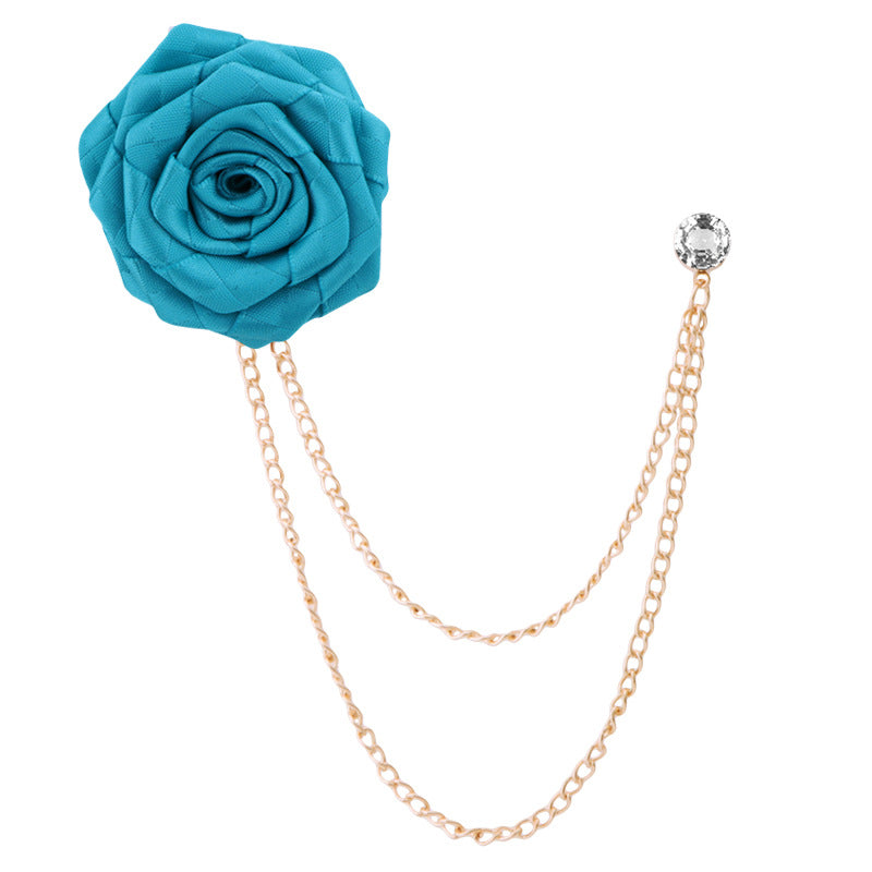 Close-up of camellia brooch with rhinestones