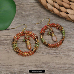 Handmade bohemian tassel earrings on display