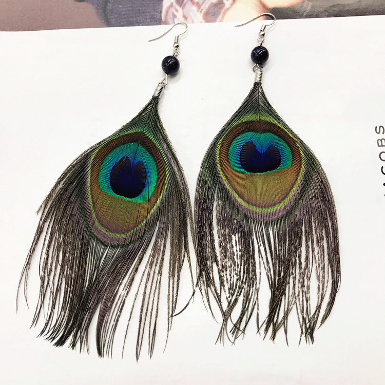 Bohemian earrings on a model 1