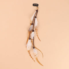 Hair clip showcasing vibrant feather patterns