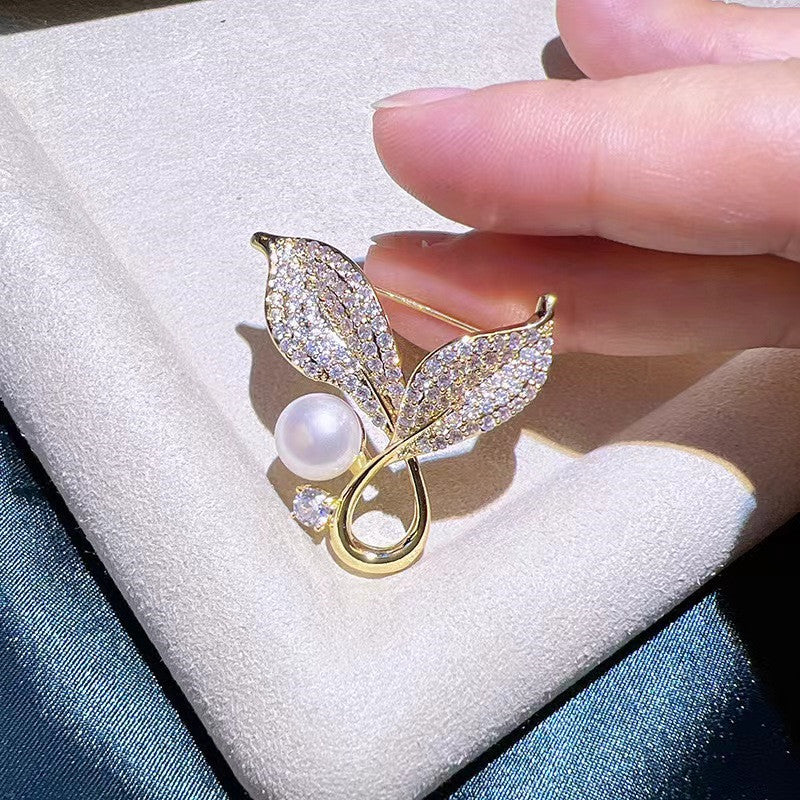 Brooch on a jewellery display focusing on details