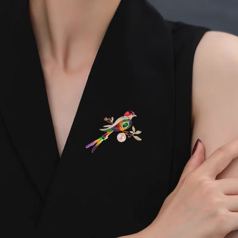 Magpie jewellery worn on a woman's dress