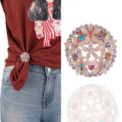 Floral rhinestone brooch on fabric