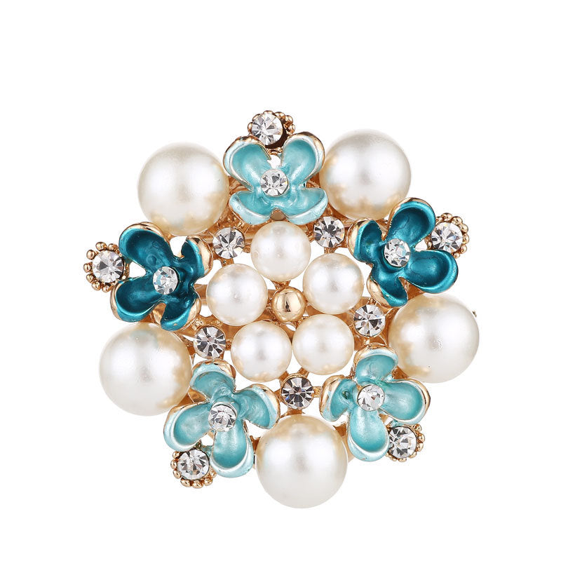 Floral brooch displayed with vibrant colours