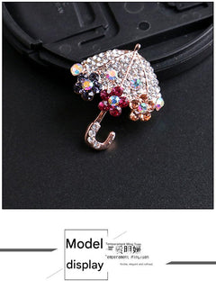 Rhinestone brooch on a scarf display