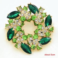 Floral brooch displayed on a cardigan