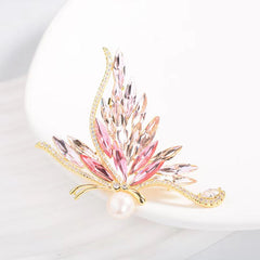 Elegant blue and pink butterfly brooch close up