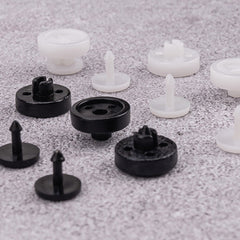 Close-up of snap-on buttons in use