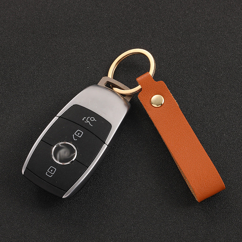 Assortment of colourful PU leather keychains displayed