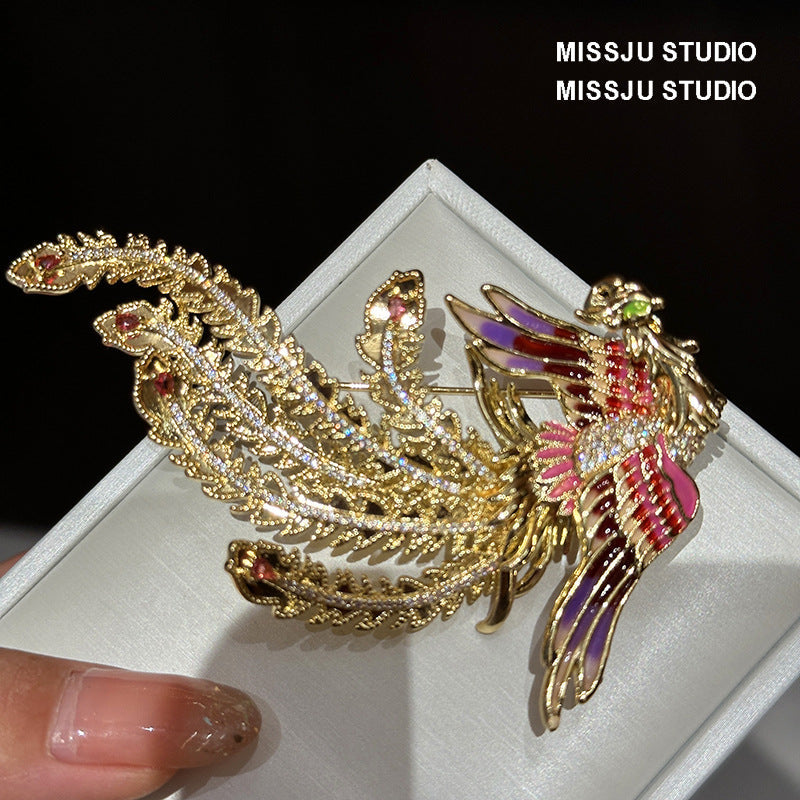 Detailed view of phoenix brooch design