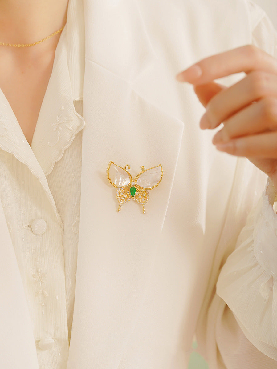 Stylish Butterfly Brooch on White Background