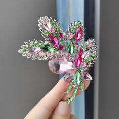 Elegant crystal floral brooch in blue